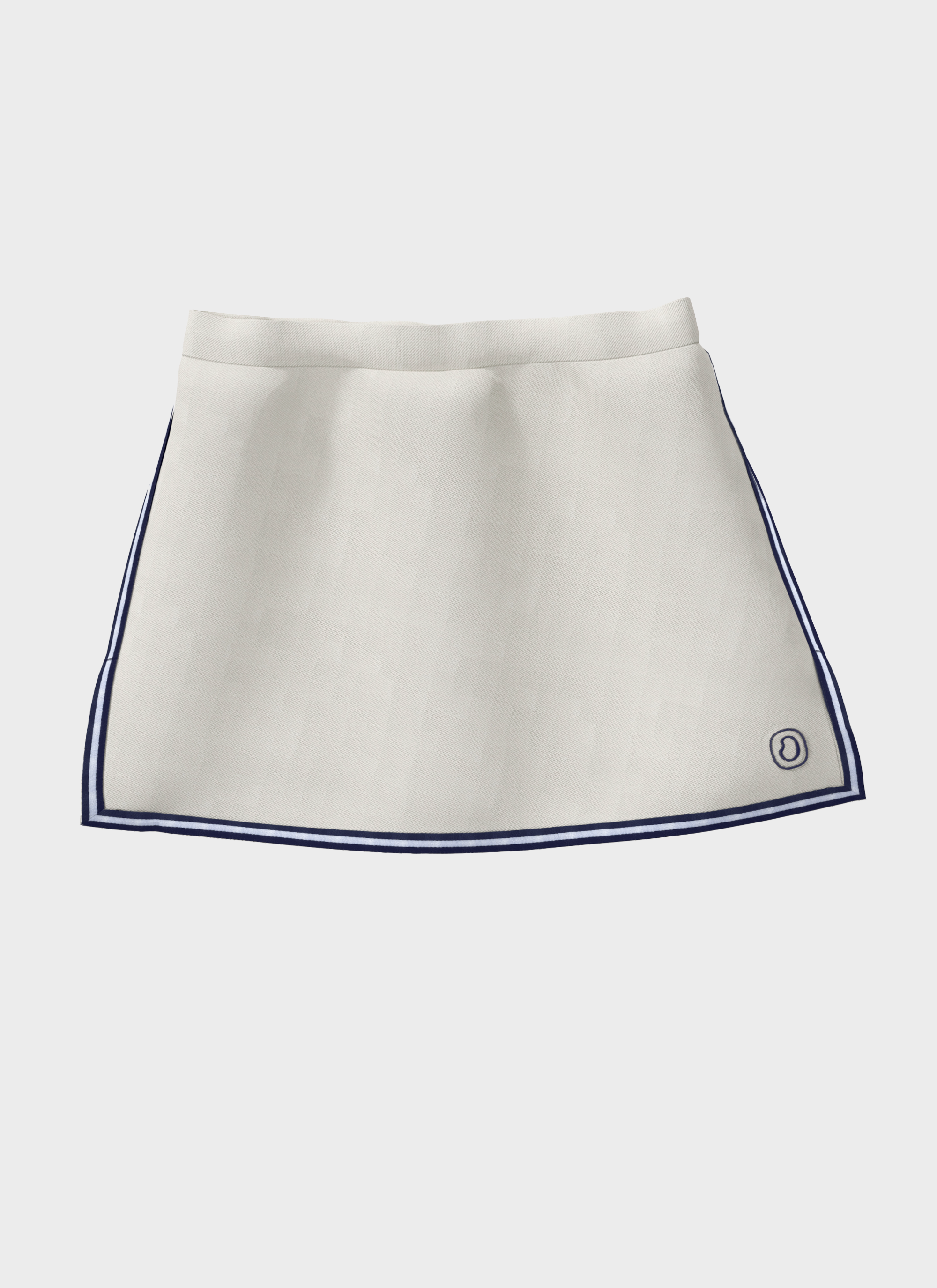 Front view of Ondine Célia Skort UPF 50+ in white with contrast piping and flared hem design.