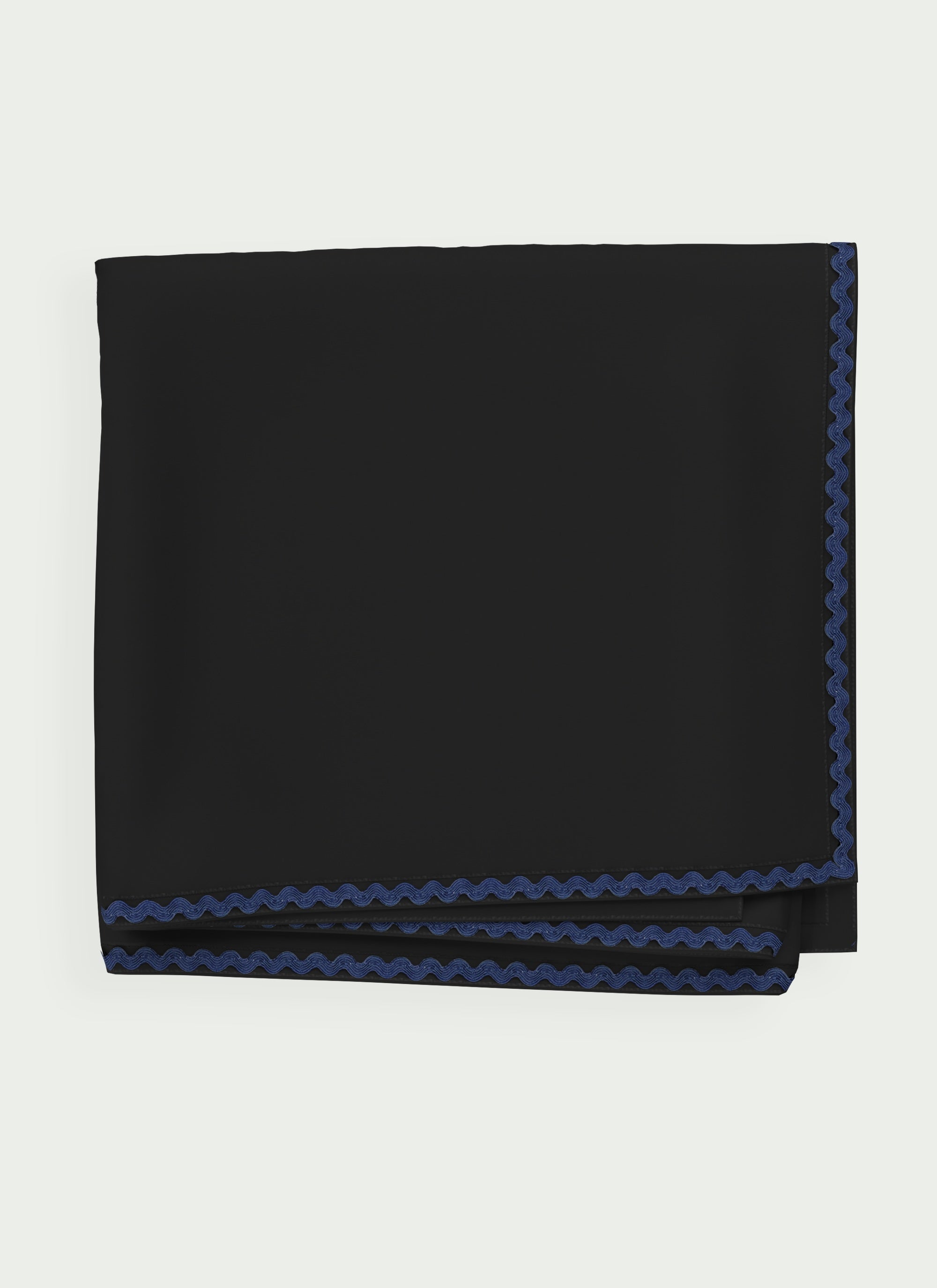 Black Ondine Elisa Sun Blanket with UPF 50+ protection and navy edge detailing.